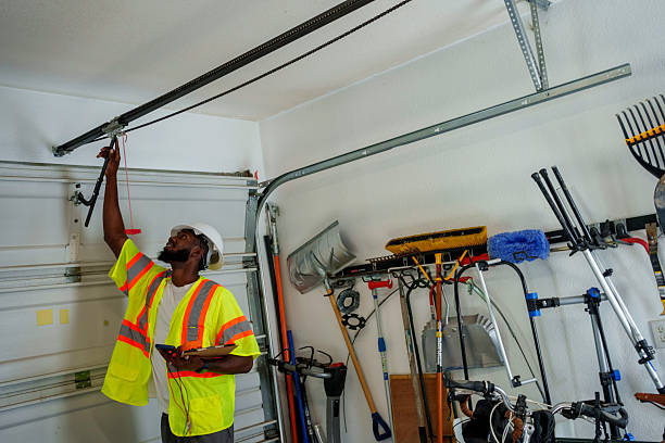 Professional Garage Door Panel Replacement technician working in Bushnell, IL